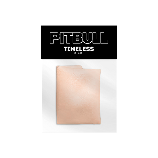 Beige bald cap in packaging with 'Pitbull Timeless Miami' branding